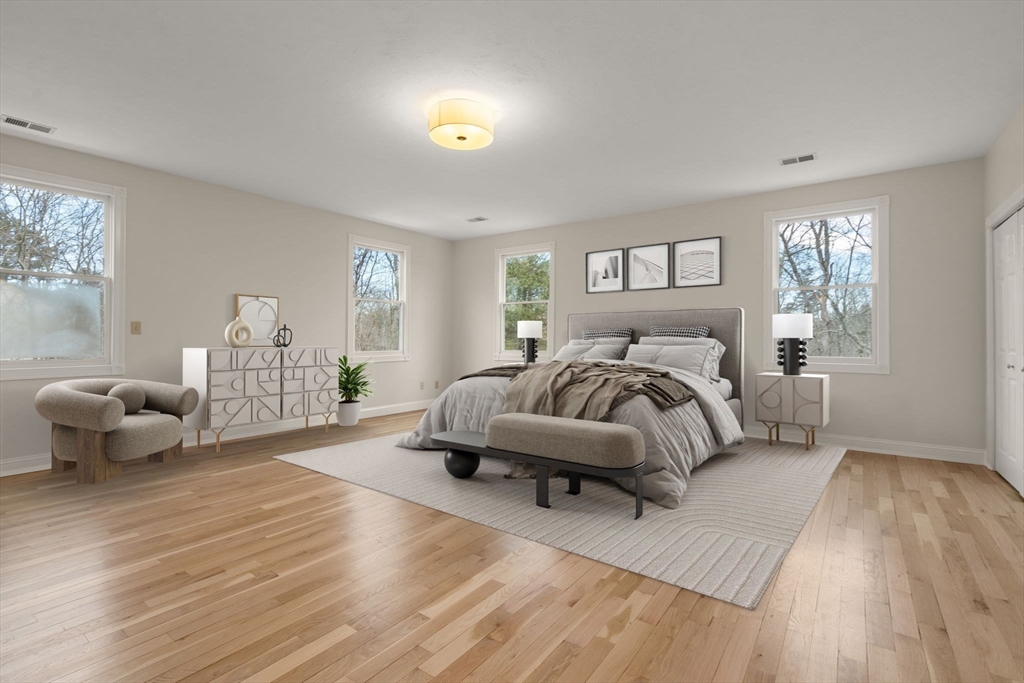 140 York Street Canton, MA 02021 - Photo 16 of 27 a bedroom with a bed and a couch