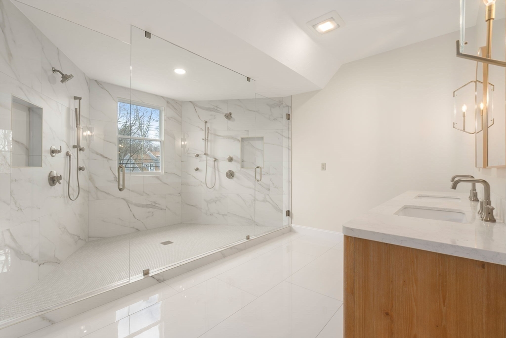 140 York Street Canton, MA 02021 - Photo 17 of 27 a bathroom with a shower and a sink