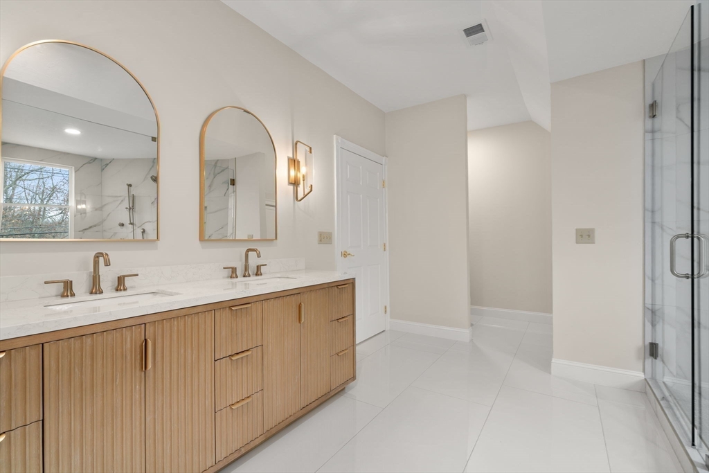 140 York Street Canton, MA 02021 - Photo 18 of 27 a spacious bathroom with a double vanity sink mirror and