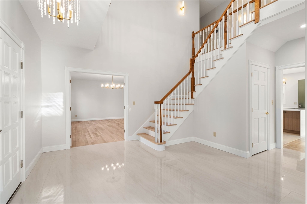140 York Street Canton, MA 02021 - Photo 2 of 27 a view of a hallway with staircase