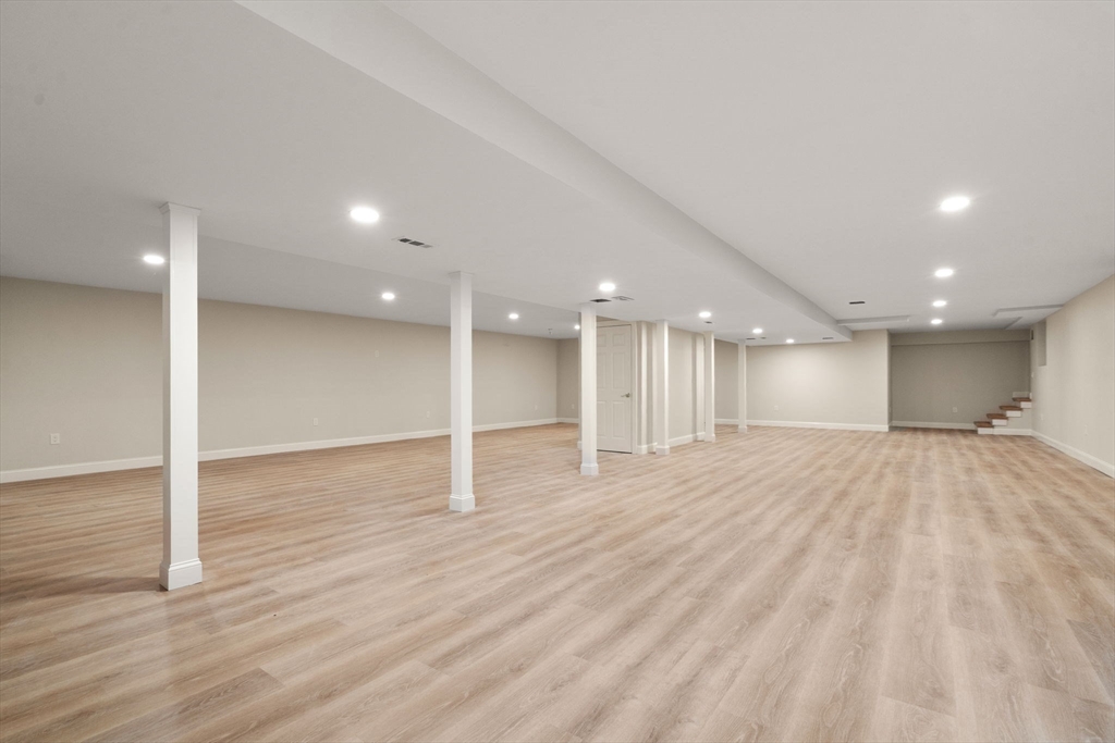 140 York Street Canton, MA 02021 - Photo 23 of 27 a view of an empty room with wooden floor