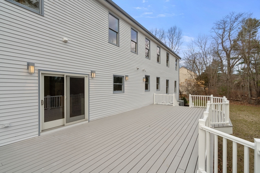 140 York Street Canton, MA 02021 - Photo 24 of 27 a view of a house with a roof deck