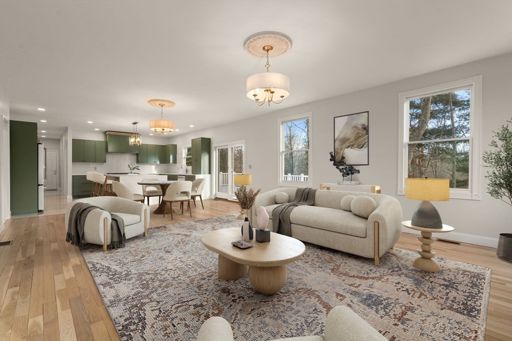 140 York Street Canton, MA 02021 - Photo 9 of 27 a living room with furniture and a large window