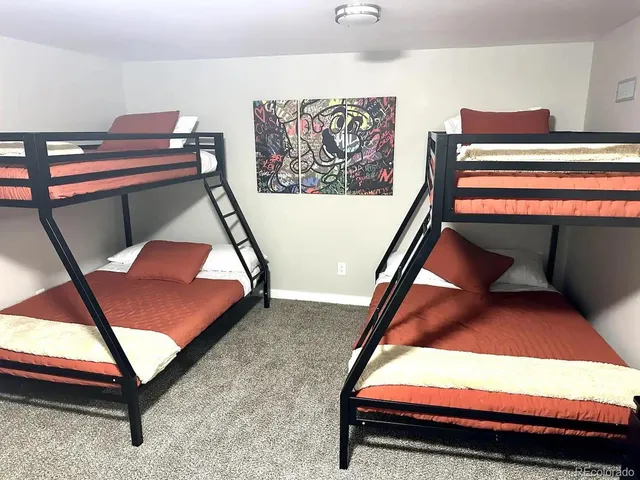 a room with furniture and air hockey table