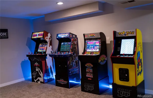 a living room with furniture and storage