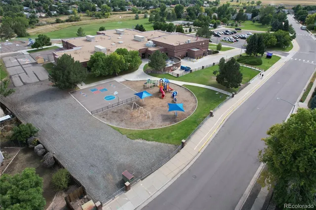 an aerial view of a house with outdoor space