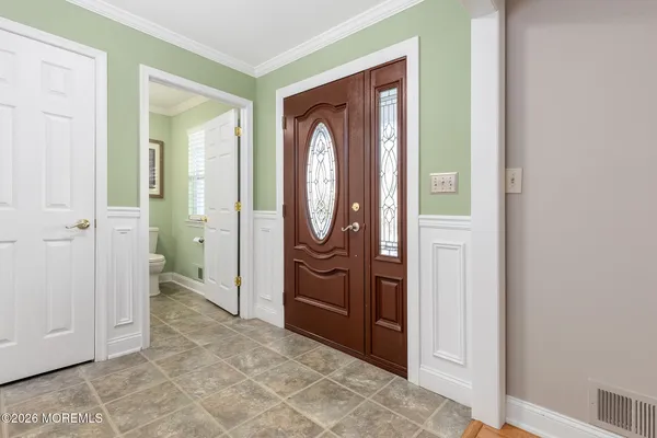 a view of a bathroom from the hallway