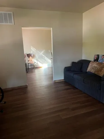 a workspace with furniture and window