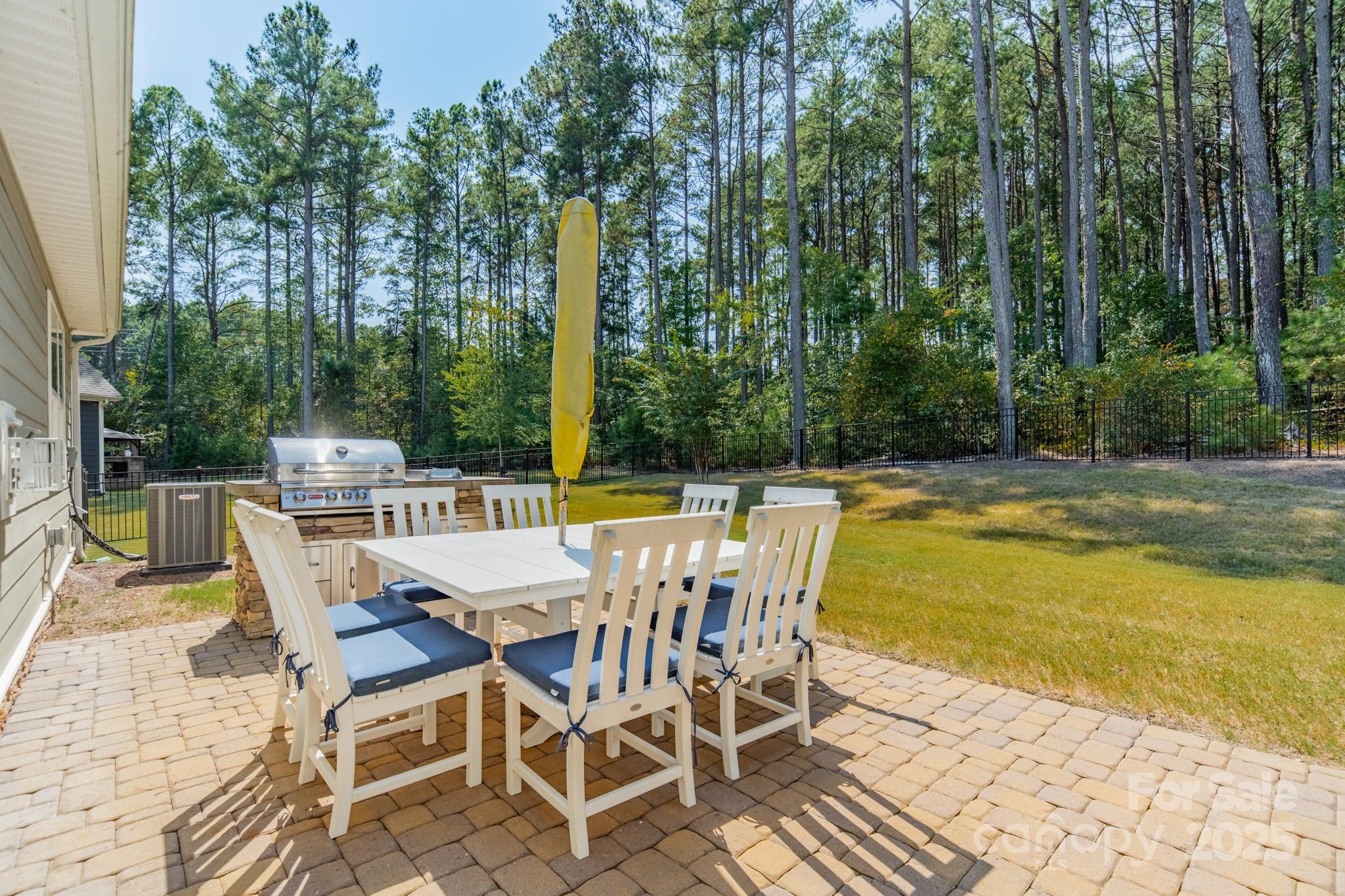 508 Vermeer Court Mount Holly, NC 28120 - Photo 20 of 24 a view of a swimming pool with a patio