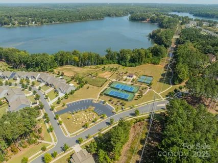 a view of lake and houses with outdoor space