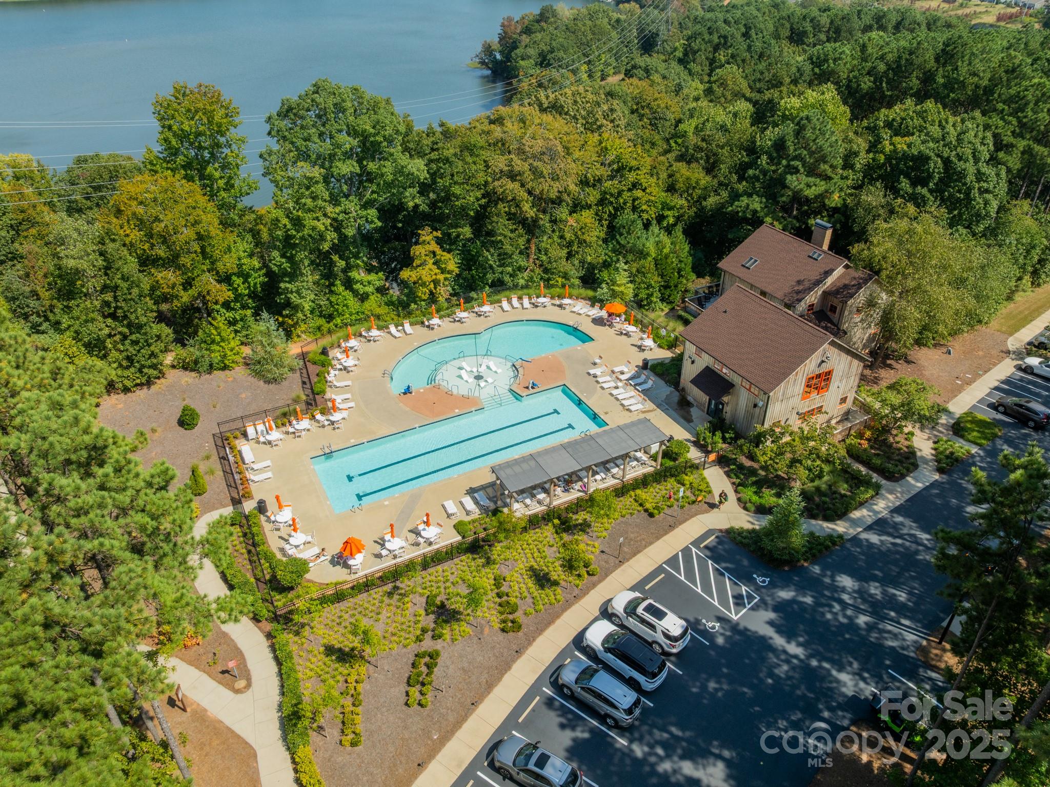 508 Vermeer Court Mount Holly, NC 28120 - Photo 24 of 24 an aerial view of a tennis ground and a large tree