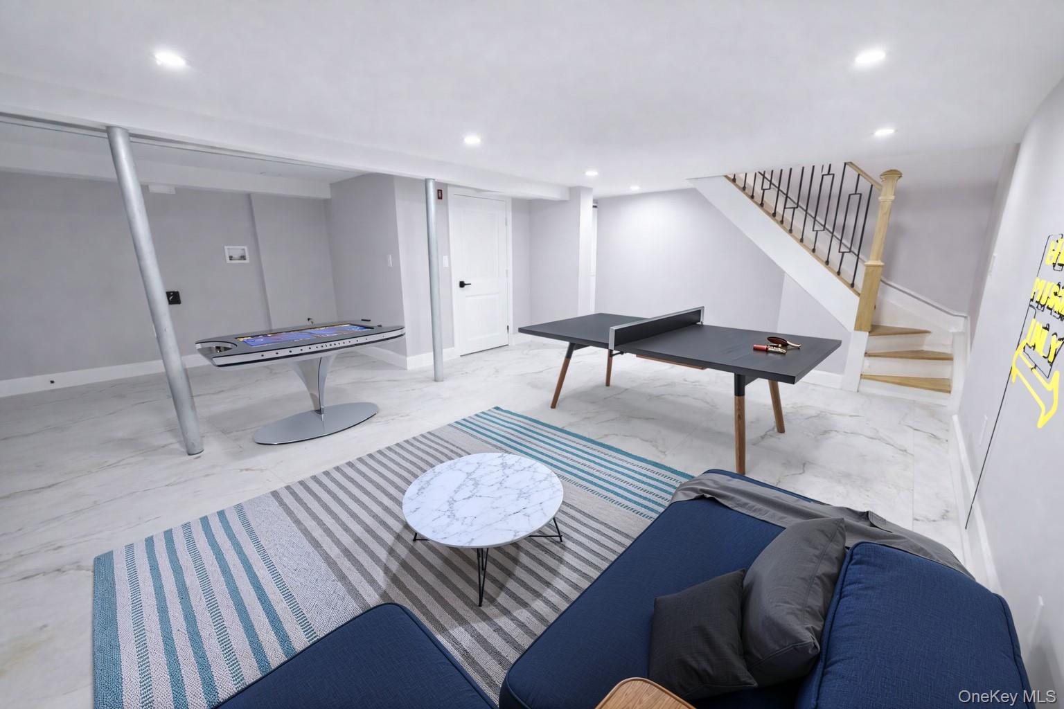 108-39 Union Turnpike Queens, NY 11375 - Photo 11 of 13 a living room with furniture and a rug