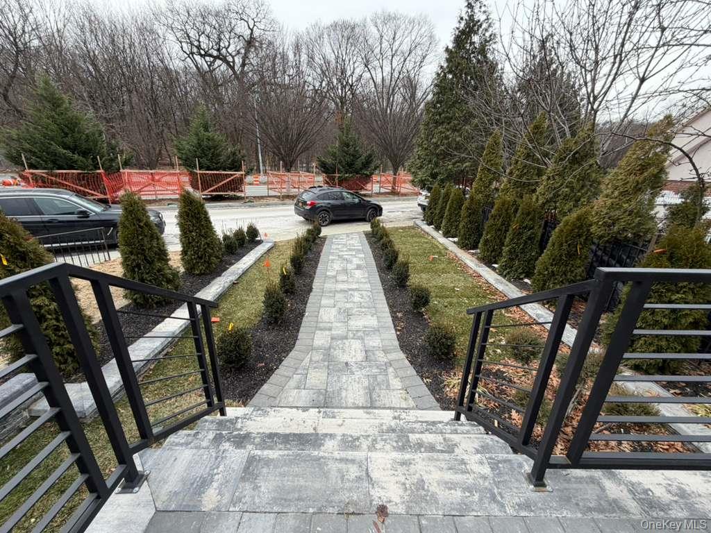108-39 Union Turnpike Queens, NY 11375 - Photo 13 of 13 a view of a swimming pool with a patio and backyard