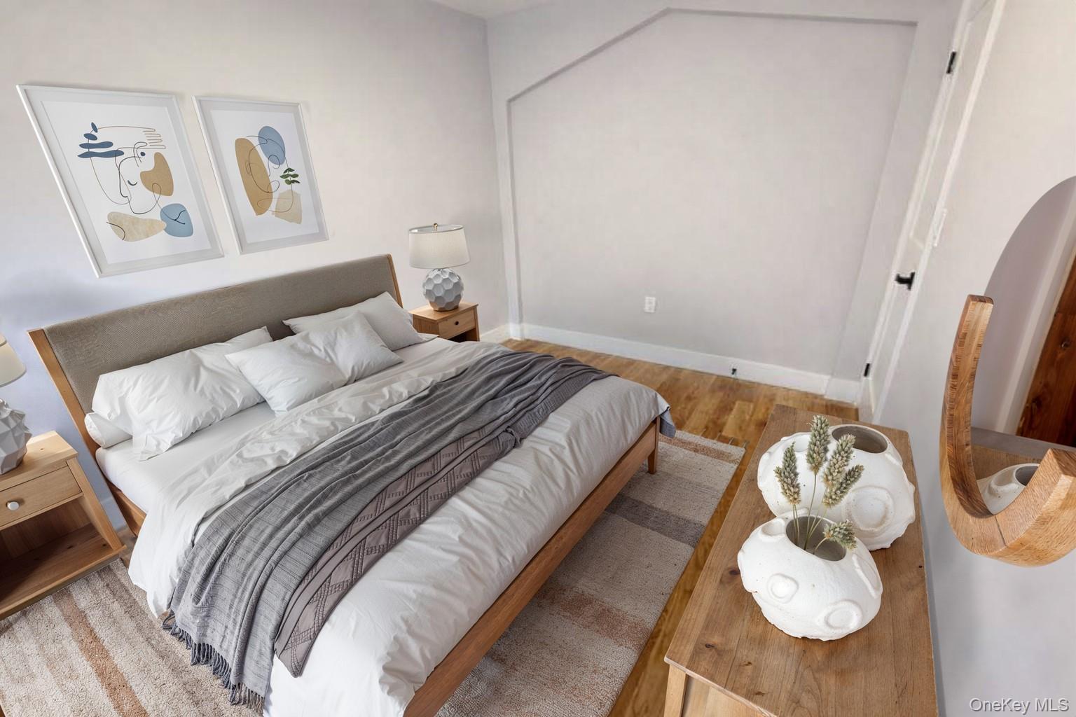 108-39 Union Turnpike Queens, NY 11375 - Photo 5 of 13 a bedroom with bed and a mirror