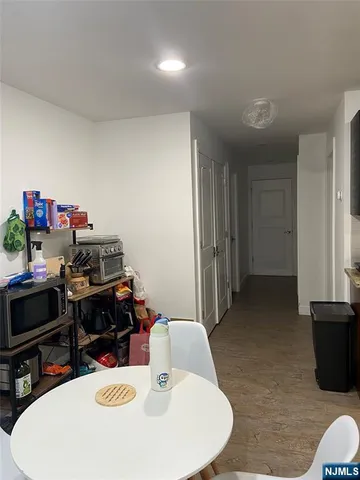 a workspace with furniture and wooden floor