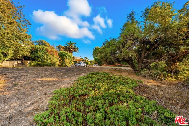 a car parked in front of a house
