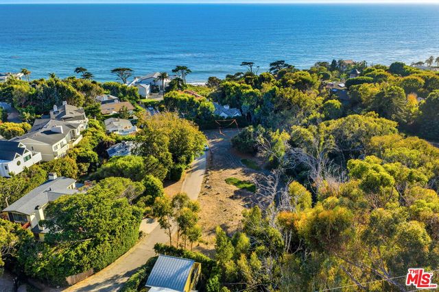 a view of swimming pool from a lake view