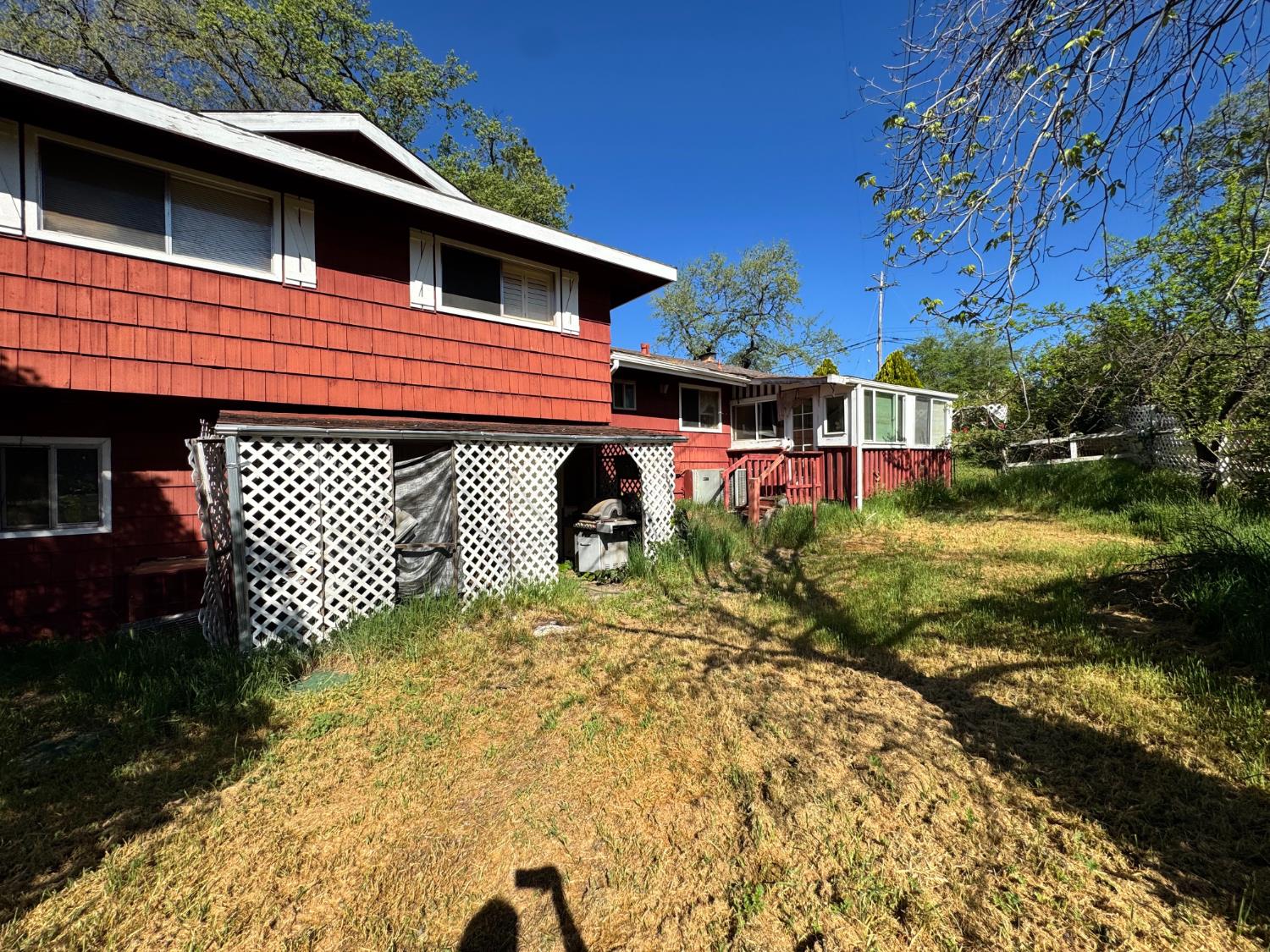 13080 Lone Star Road Auburn, CA 95602 - Photo 10 of 14 a front view of a house with a yard