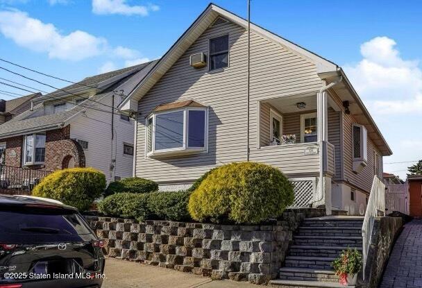 334 Neal Dow Avenue Staten Island, NY 10314 - Photo 1 of 37 a view of a house with a yard