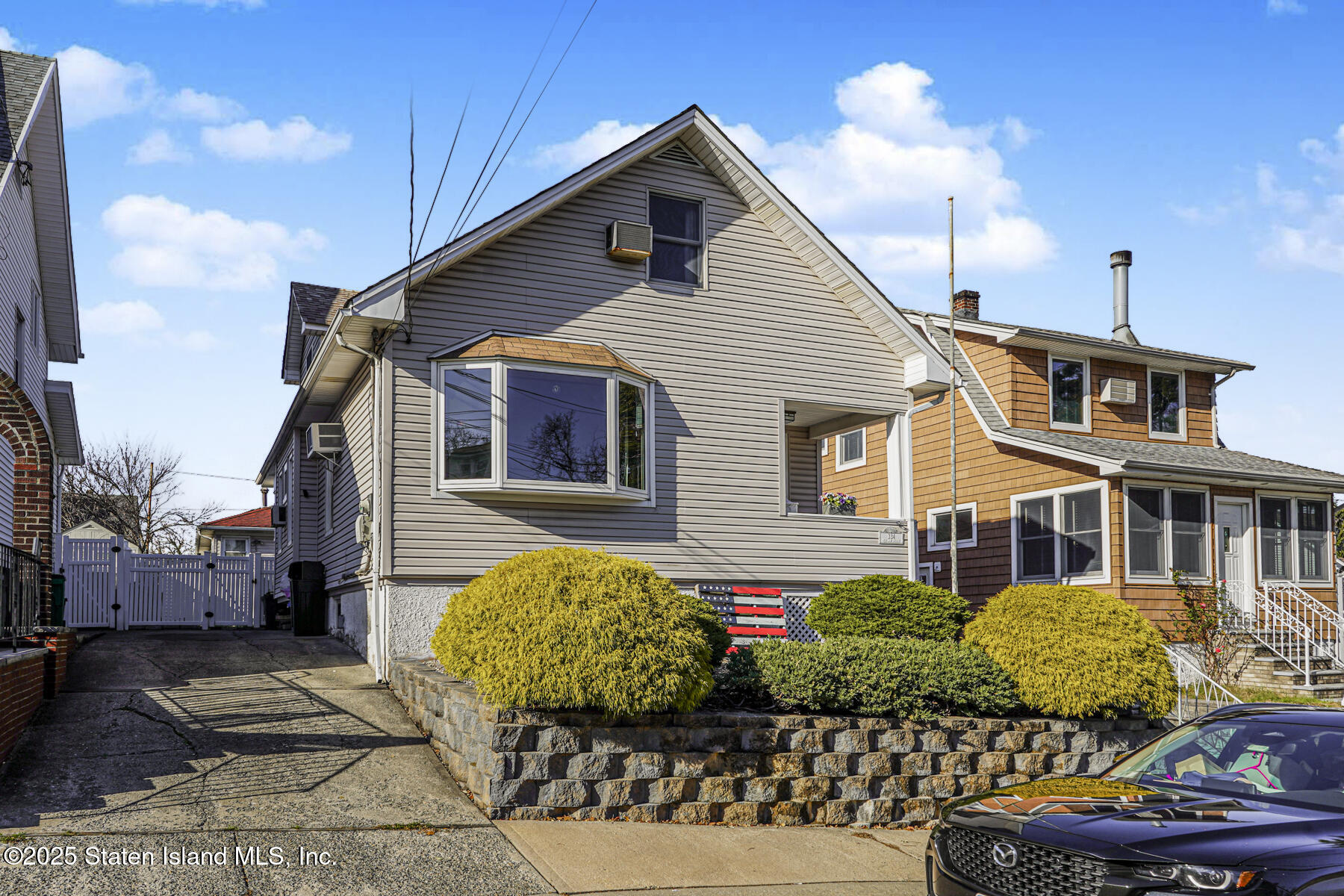 334 Neal Dow Avenue Staten Island, NY 10314 - Photo 2 of 37 a view of a house with a yard and potted plants