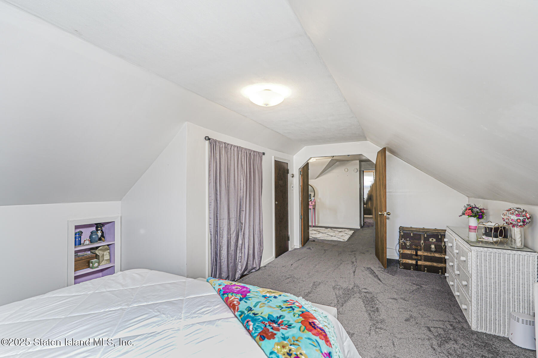 334 Neal Dow Avenue Staten Island, NY 10314 - Photo 26 of 37 a view of a bedroom with baby toys and deck
