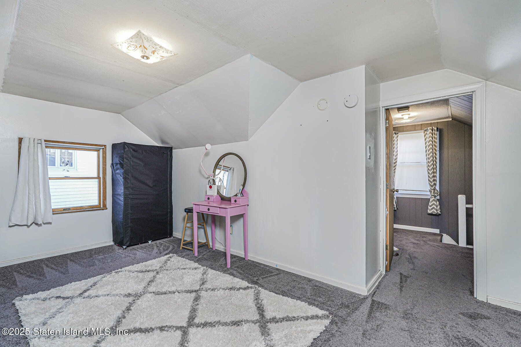 334 Neal Dow Avenue Staten Island, NY 10314 - Photo 28 of 37 a view of a livingroom with furniture and a window