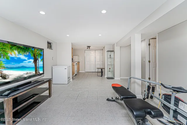 a room with furniture and air hockey table