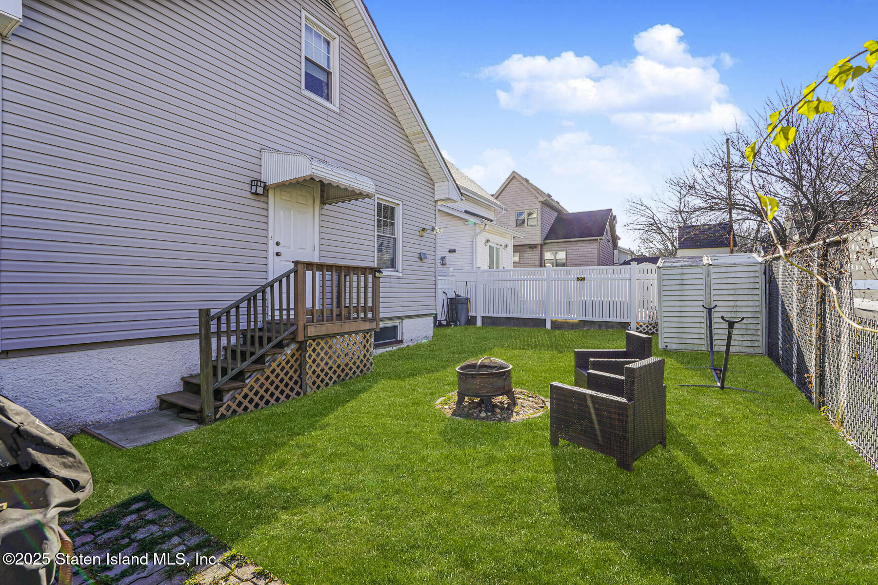 334 Neal Dow Avenue Staten Island, NY 10314 - Photo 35 of 37 a view of a house with a yard