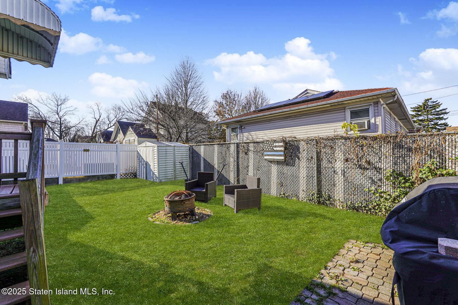 334 Neal Dow Avenue Staten Island, NY 10314 - Photo 37 of 37 a view of backyard with barbeque grill potted plants and large tree