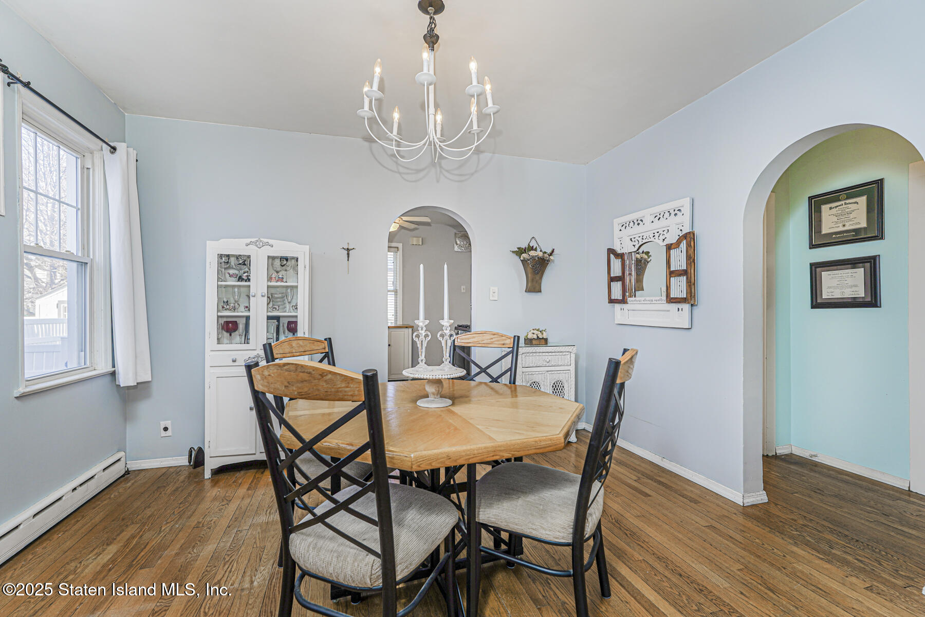 334 Neal Dow Avenue Staten Island, NY 10314 - Photo 8 of 37 a view of a dining room with furniture and wooden floor