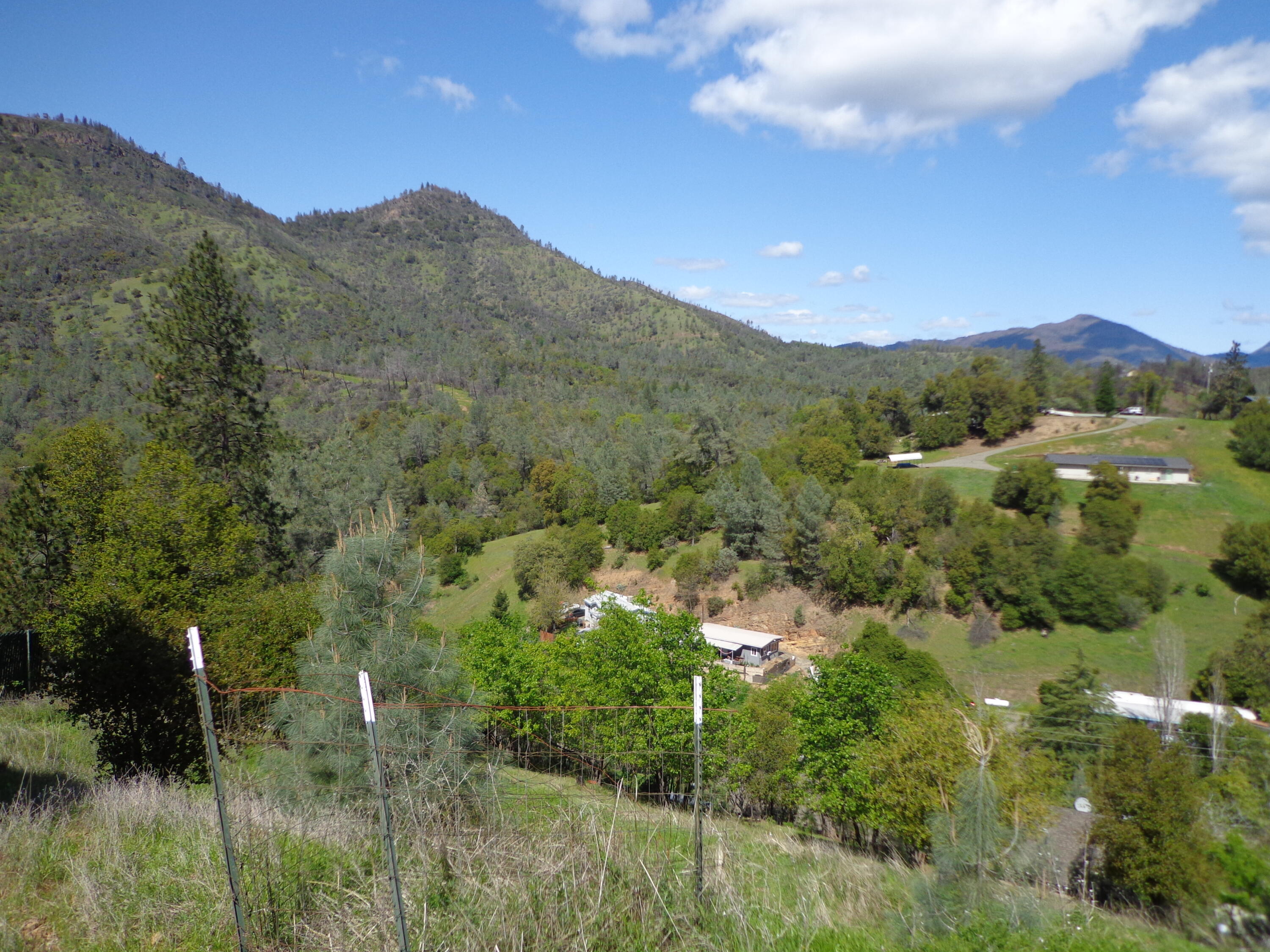 22076 Loop Drive Redding, CA 96003 - Photo 2 of 17 a view of a city with mountains in the background