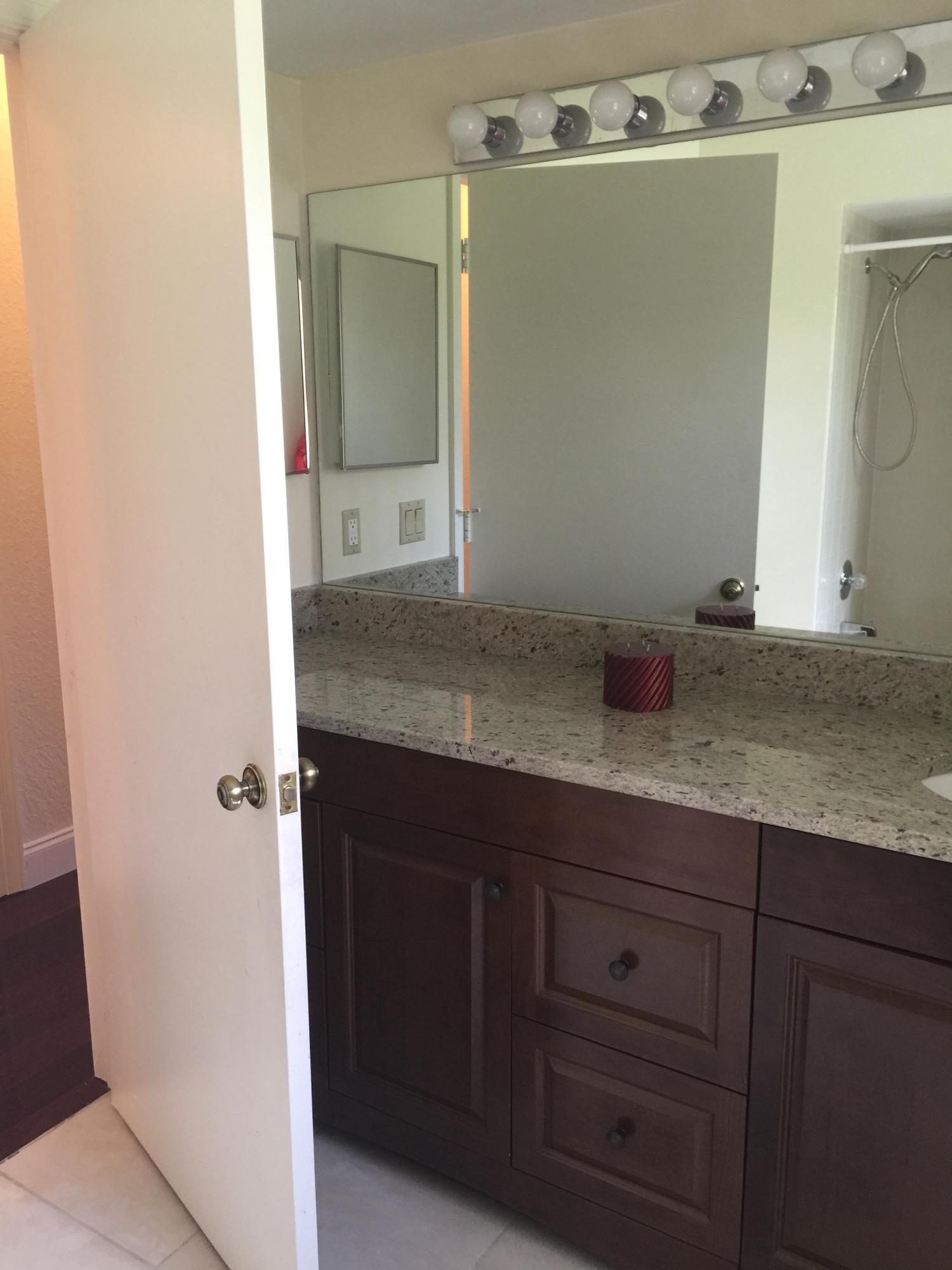 285 Northwest 69th Street Boca Raton, FL 33487 - Photo 22 of 30 Mahogany cabinets