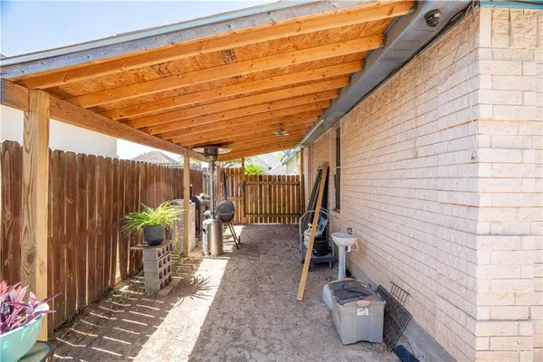 a view of living room with baby toys and dresser