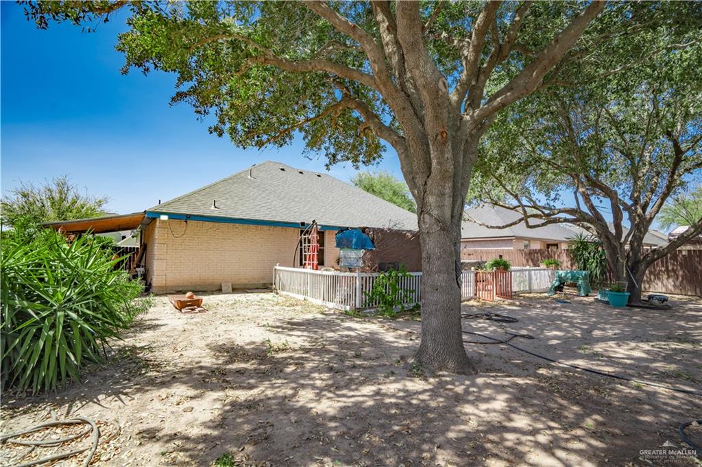 3006 Gabriel Street Mission, TX 78574 - Photo 19 of 34 a front view of a house with a yard and garage