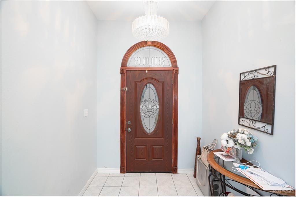 3006 Gabriel Street Mission, TX 78574 - Photo 21 of 34 a view of living room with baby toys and dresser
