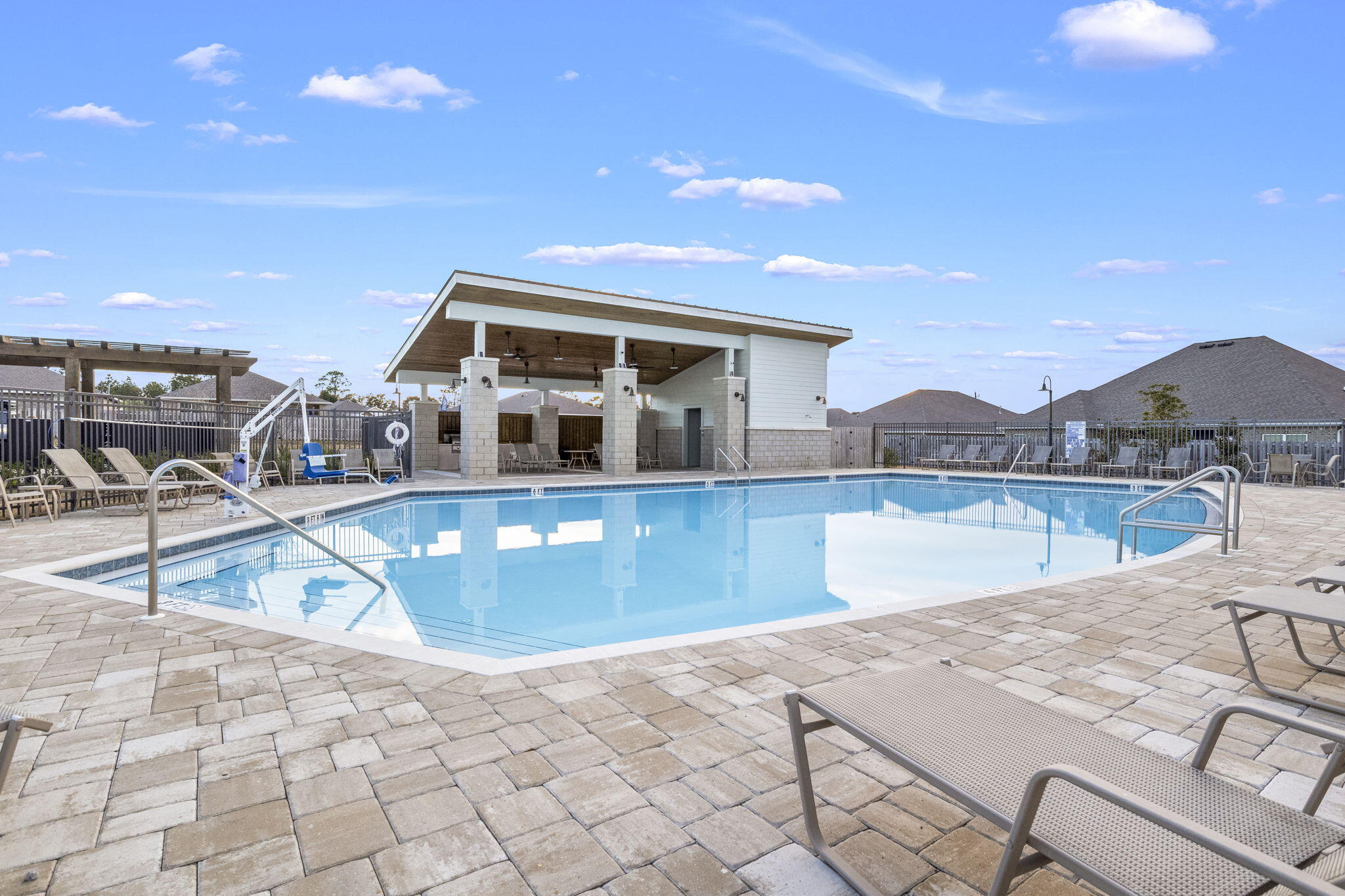 4671 Marine Loop Crestview, FL 32539 - Photo 33 of 37 a view of a swimming pool with a lounge chairs