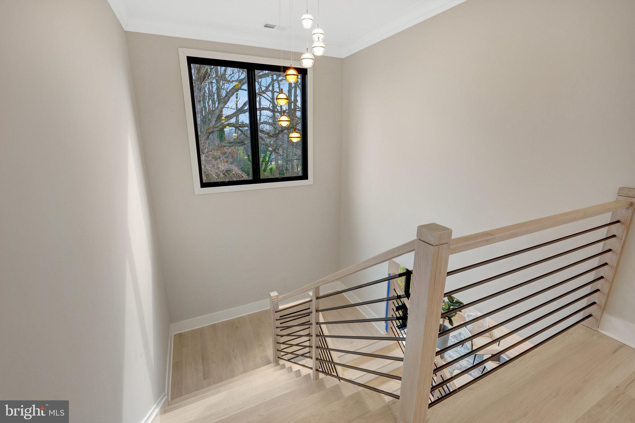 7916 Lewinsville Road McLean, VA 22102 - Photo 25 of 100 Modern chandelier above the stairs
