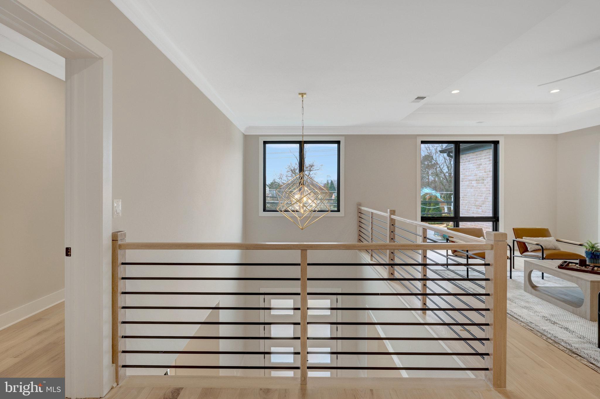 7916 Lewinsville Road McLean, VA 22102 - Photo 28 of 100 Modern chandelier above the stairs