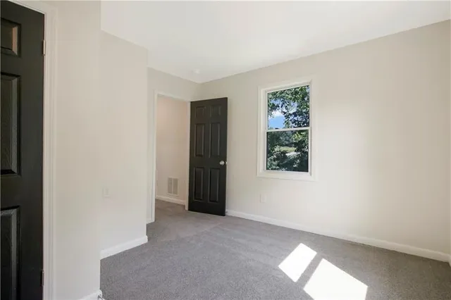 an empty room with windows