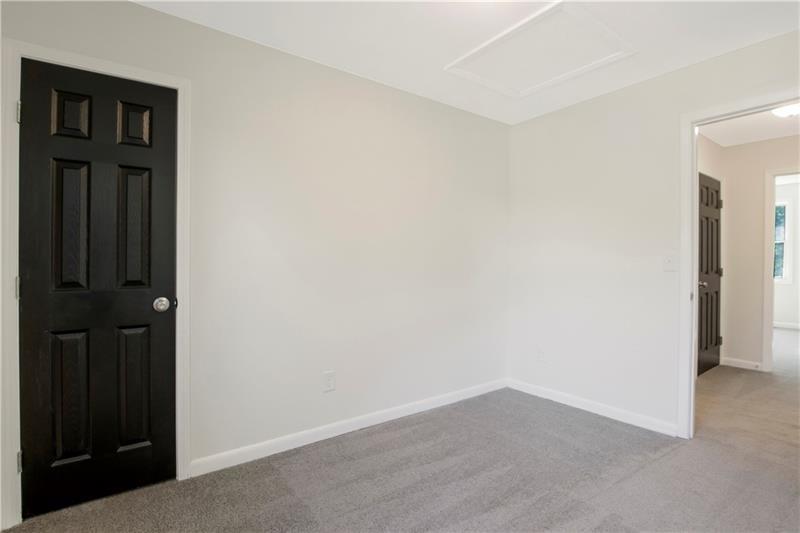 551 Valley Hill Road Southeast, Unit A Riverdale, GA 30274 - Photo 33 of 42 wooden floor in an empty room