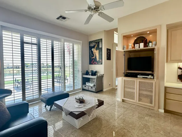 a bathroom with a sink toilet and a mirror