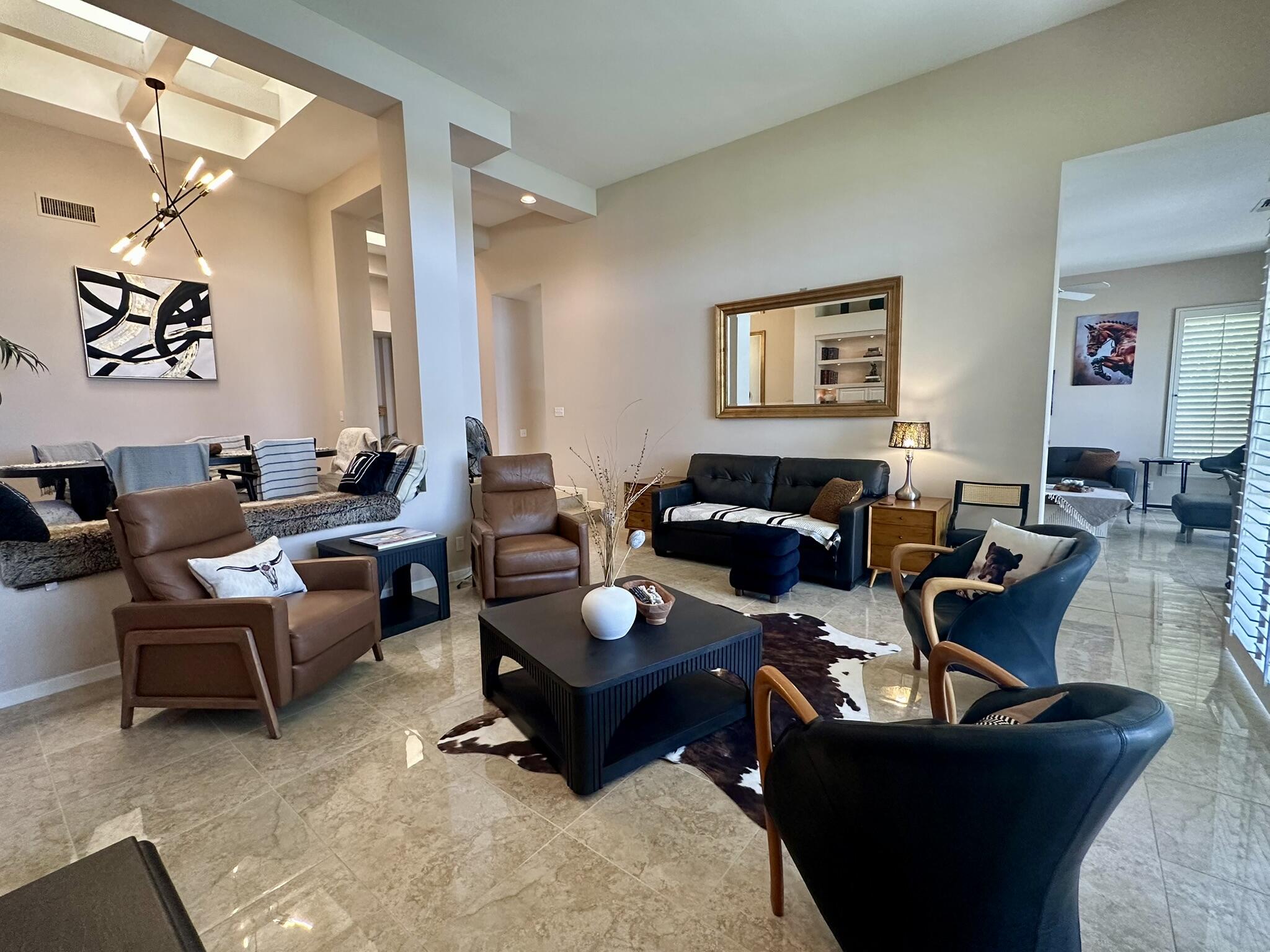 57600 Interlachen La Quinta, CA 92253 - Photo 5 of 33 a living room with furniture and a wooden floor