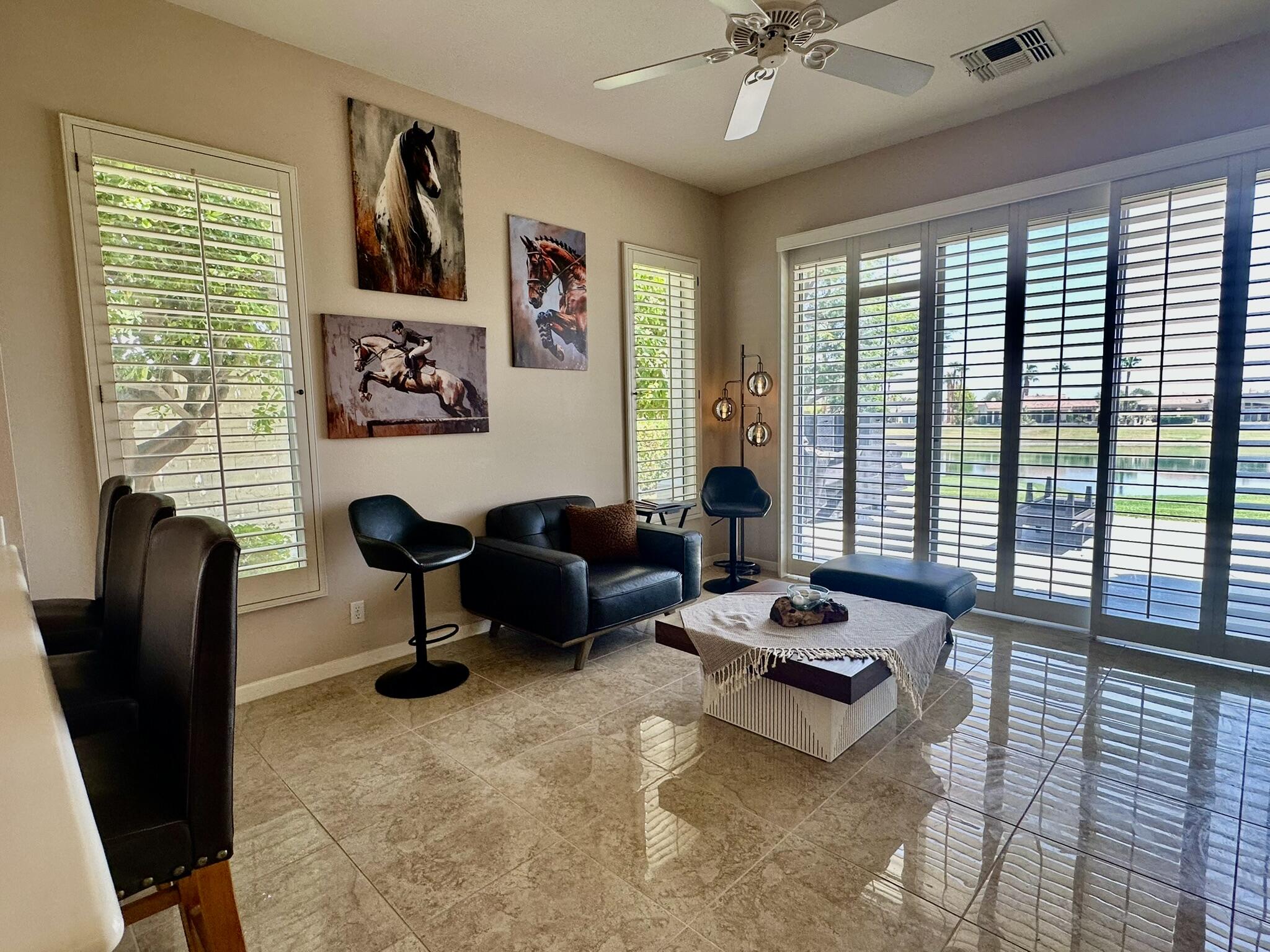 57600 Interlachen La Quinta, CA 92253 - Photo 10 of 33 a living room with furniture and a window