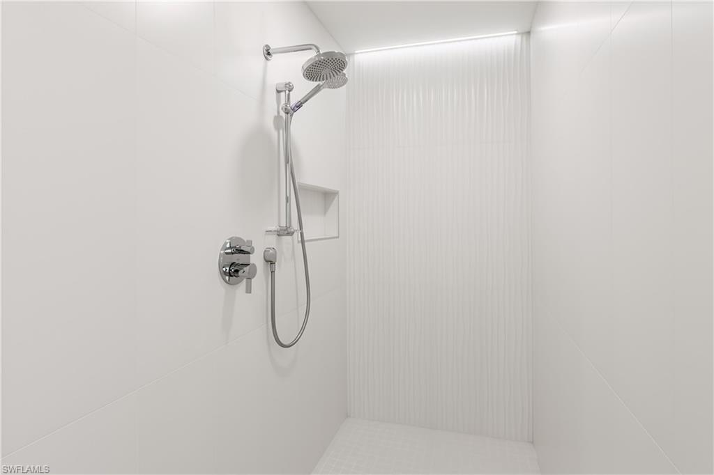 3511 17th Avenue Southwest Naples, FL 34117 - Photo 17 of 32 a bathroom with a shower