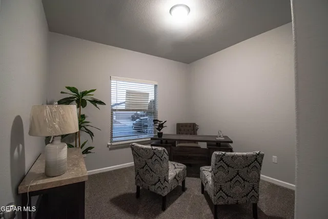 a room with furniture and windows