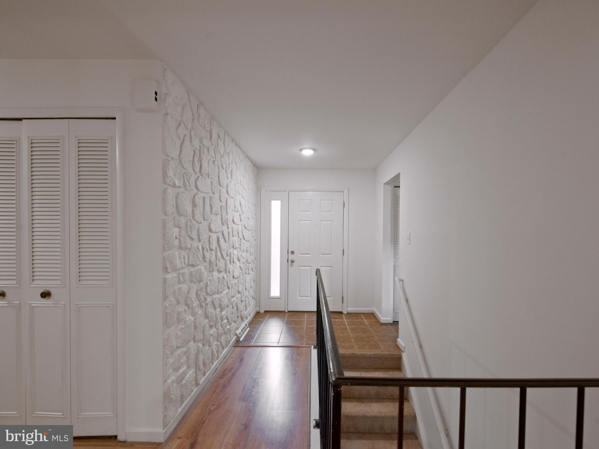 2360 Old Trail Drive Reston, VA 20191 - Photo 18 of 40 Foyer/Basement stairs