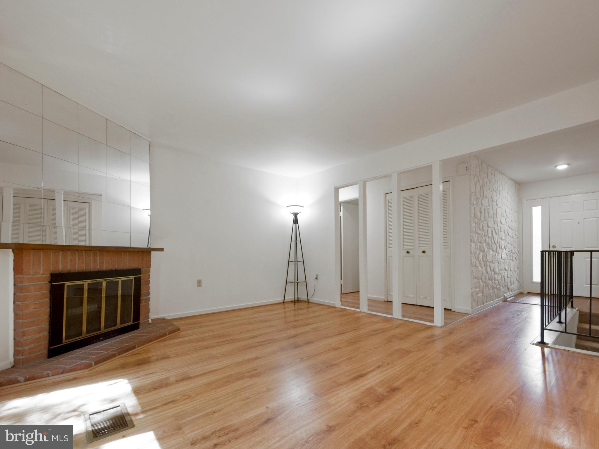 2360 Old Trail Drive Reston, VA 20191 - Photo 9 of 40 Living room w/ wood burning fireplace