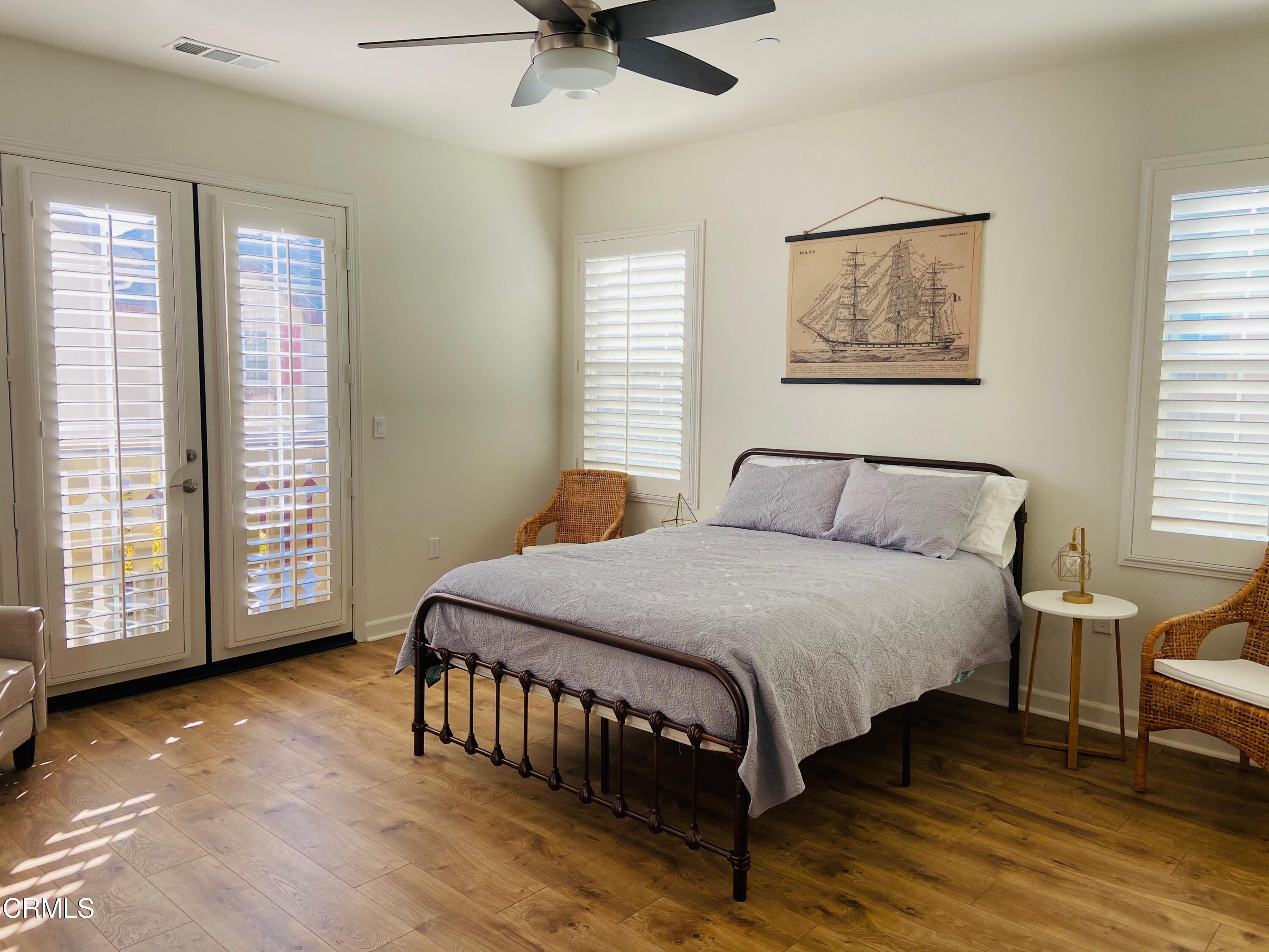 1645 Range Road Oxnard, CA 93036 - Photo 16 of 34 a bedroom with a bed a table and chair