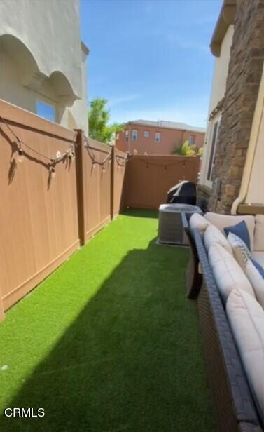 1645 Range Road Oxnard, CA 93036 - Photo 23 of 34 a backyard of a house with table and chairs