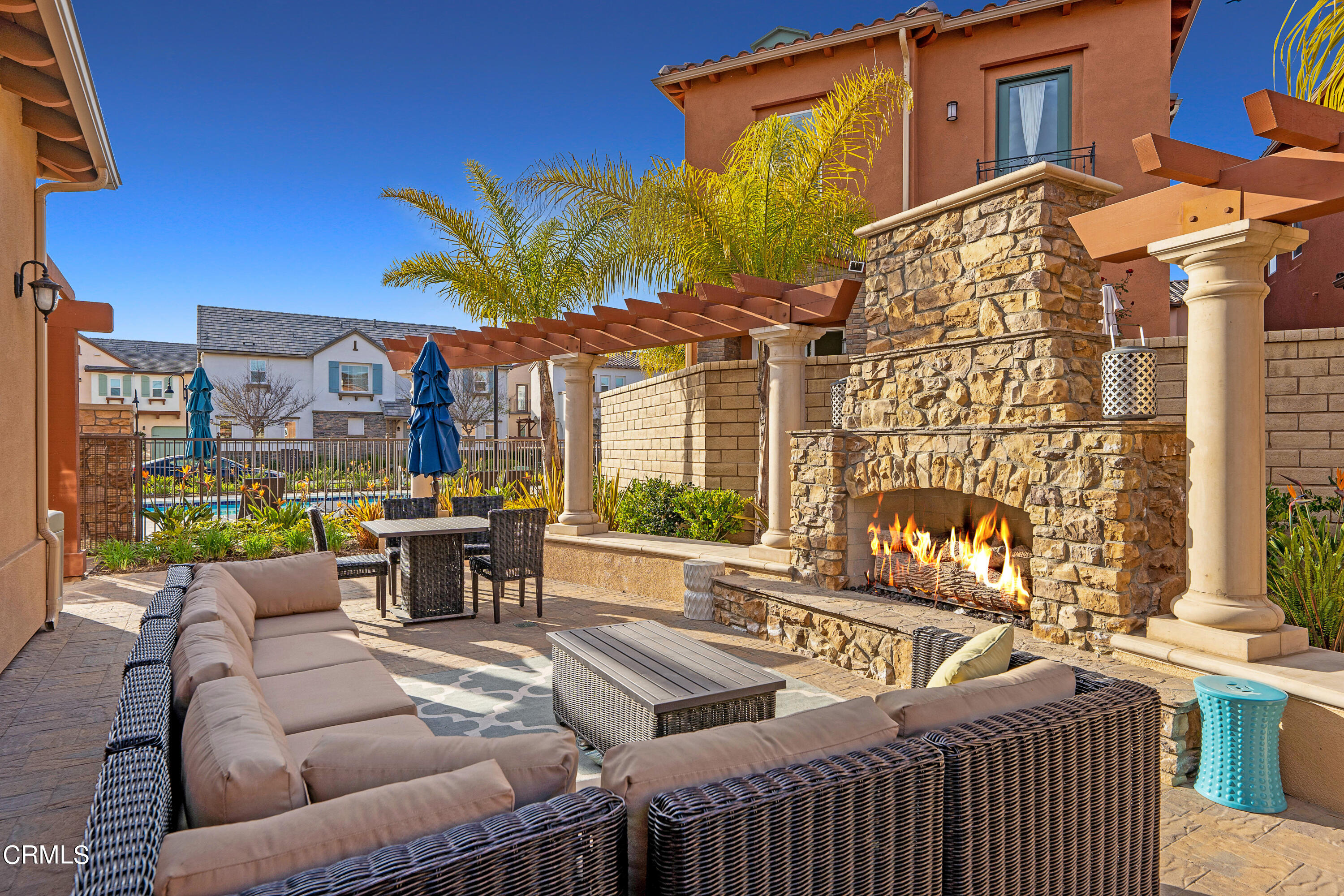 1645 Range Road Oxnard, CA 93036 - Photo 29 of 34 a view of a patio with couches table and chairs and potted plants